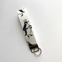 Penguins doin stuff! Fabric Keychain Wristlet